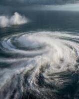 A large wave is seen in the ocean photo