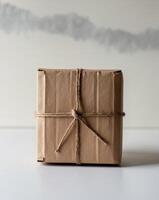 A brown box with a string tied around it photo