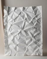 Blank white crumpled and creased paper poster texture photo