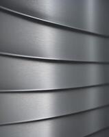 Textured metallic background with subtle waves and a polished look photo