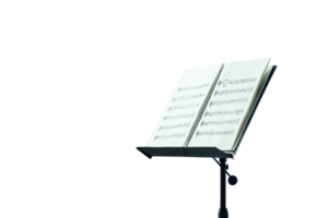 Close-up of an open sheet music book on a stand with a plain background, highlighting musical notes and composition. Perfect for music themes. png