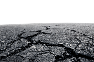 Close-up of cracked asphalt surface, symbolizing deterioration, damage, and imperfection in urban environments. Perfect for backgrounds or themes. png