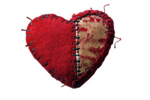 Handmade fabric heart with red and beige patches, showing unique stitching as an artistic representation of love and creativity. png