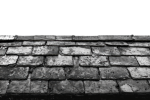 Weathered slate roof with aged texture and organic patterns, showcasing rustic architectural elements in monochrome tones. png