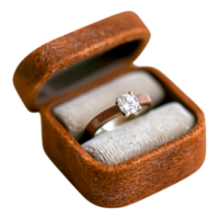 Elegant diamond engagement ring in a vintage brown box png