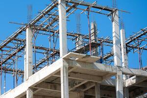 A building under construction with scaffolding photo