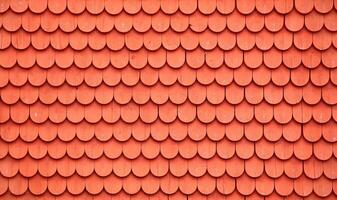 Texture of wooden tiles painted typically Swedish with falu red photo