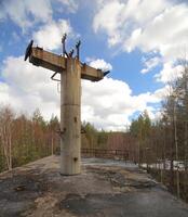 Abandoned platform of old railway structure in Sweden photo