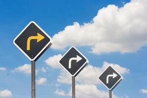 Three signs with arrows pointing in different directions photo