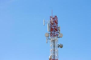 A cell phone tower with multiple antennas photo