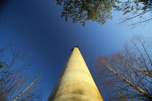 Conceptual low angle view of concrete pillar of the disused Norsjo aerial tramway photo