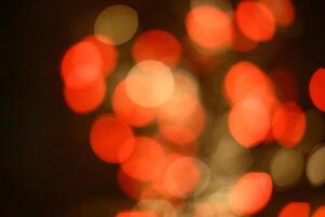 Blurred red and yellow lights with slightly oval shape photo