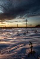 Winter sunset in Swedish Lapland, with breakable crust on the snow photo