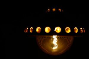 LED filament globe resembling an old carbon filament light bulb photo