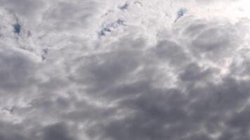 White cumulus clouds fly slowly in blue sky. Overcast weather before summer rain. Meteorology background with copy space video