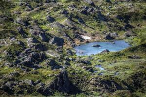 Small lake in the valley Karkevagge in Lapland photo