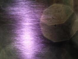 Abstract shot of sunlight reflections on the water and lens flare bokeh photo