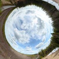 Rabbit hole panorama of forest and clearing in Vasterbotten, Sweden photo