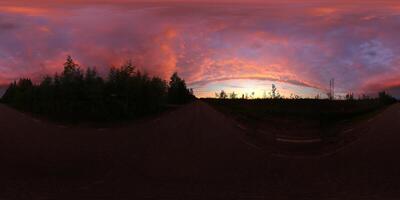 Spherical panorama of impressively colored sky over street in Vasterbottens forests, shortly before heavy rain photo