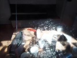 Conceptual shot of light effects in window pane and an abandoned desk photo
