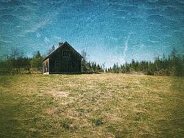 Grungy shot of abandoned house in Swedish Lapland photo