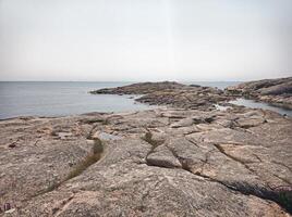 Coast of the island Hallon, a nature reserve near Smogen in Sweden photo