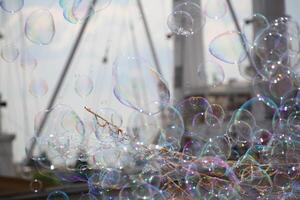 Many colorful bubbles in front of ship photo