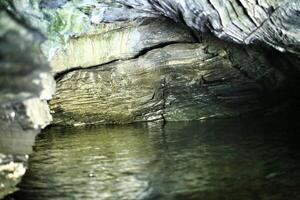 Water level inside Bjorkliden Cave in Swedish Lapland photo
