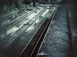 Grungy grey shot of train filled with gravel photo