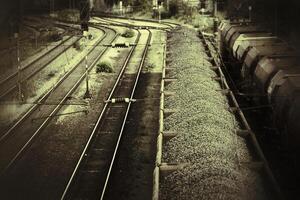 Grungy sepia shot of train filled with gravel photo