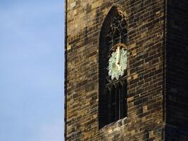Dial of Magdeburger Dom Magdeburg Cathedral with bright sunlight reflections photo