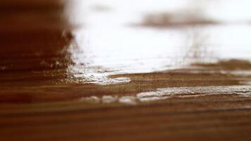 Uneven layer of linseed oil paint on wooden surface photo