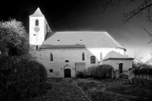 Conceptual black and white shot of historic church in Ottersleben, Magdeburg photo