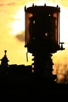 Abstract shot of vintage industrial device with valves and electrical components photo
