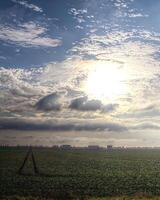 Beautiful cloudscape and field near Magdeburg in Germany photo