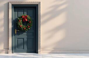 Front door decorated amazing with Christmas tree branches and mistletoe, dark wall background free space for text photo