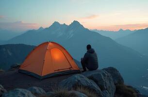 Man handsomehiking tourist in mountains. Active vacation in nature photo