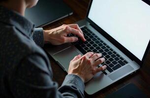 Man Worker Work Laptop Desk Office remote work on notebook photo