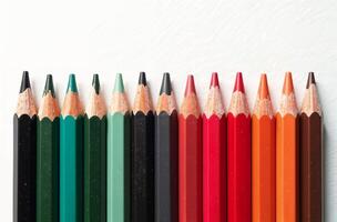 Pencils lie on white paper art tool for hobby of drawing photo
