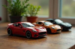 Toy colored model of cars stand on wooden table in playroom photo