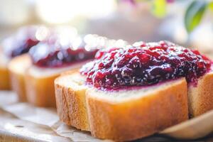 A piece of bread with jam on it photo