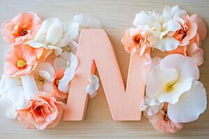 The letter n is made of flowers and leaves photo
