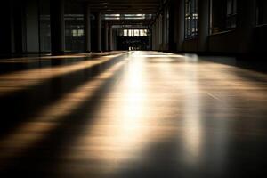 A long hallway with sunlight shining through the windows photo