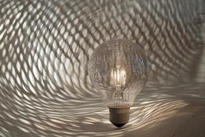 A Light Bulb Casts Shadows on a Textured Surface photo