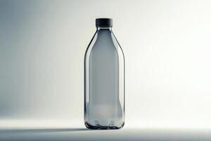 A Single Clear Plastic Bottle with a Black Cap on a White Background photo