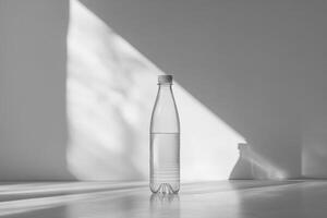 A Clear Plastic Water Bottle with a White Cap on a White Surface photo