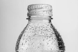 Close-up of a Water Bottle Covered in Condensation photo