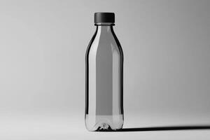 A Clear Plastic Bottle with a Black Cap on a White Background photo