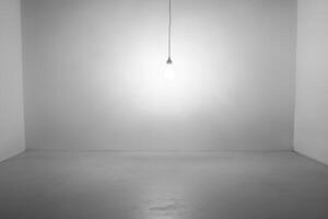 A Single Lightbulb Hanging in a White Room photo