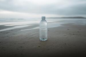 A Plastic Water Bottle on a Sandy Beach photo